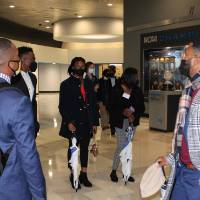 People in suits talking